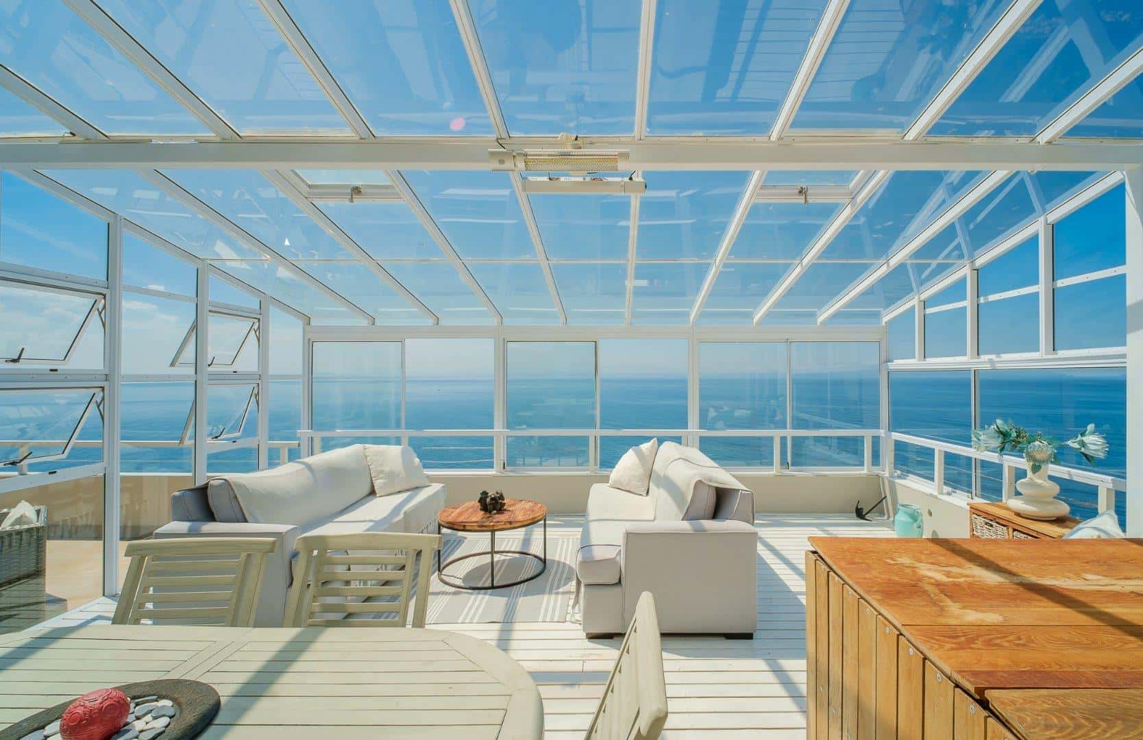 Stunning 4-Bedroom Coastal Retreat with Panoramic False Bay Views in Sunny Cove, Fish Hoek